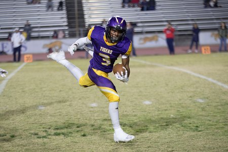 Lemoore's Kobe Green with an exciting run Friday night against Justin Garza High School.